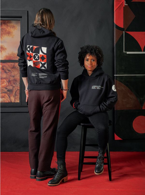 Models showing the front and back of JXTA/Red Wing Shoes hoodie